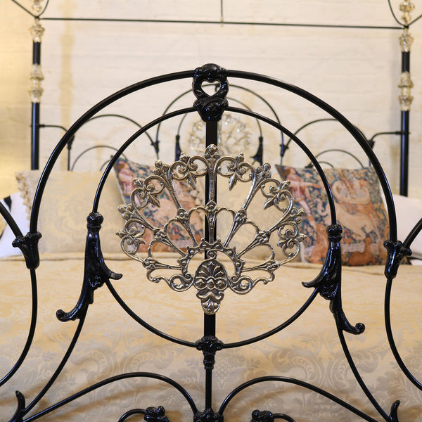 Magnificent super king brass and iron four poster bed with crown and canopy - close up photo