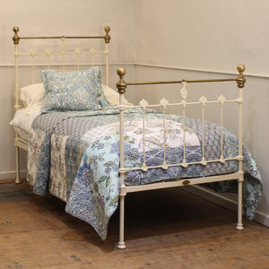 single antique bed in cream