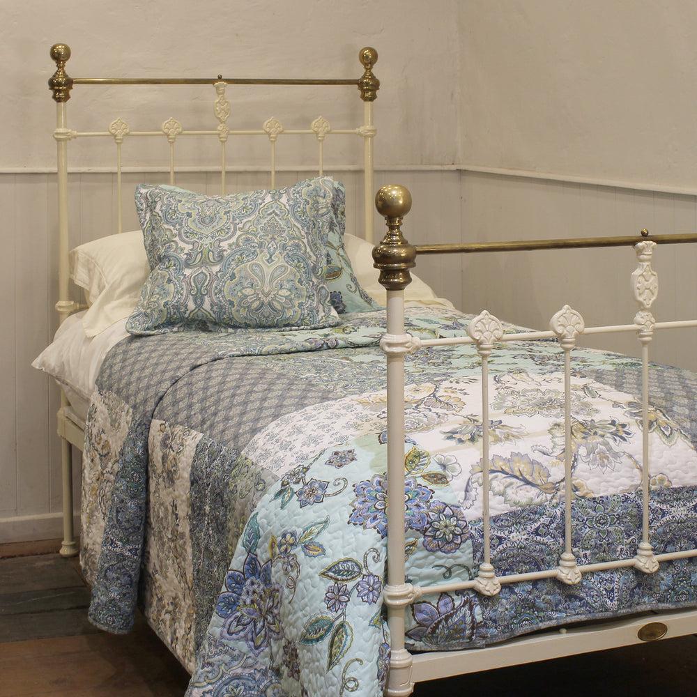 single antique bed in cream