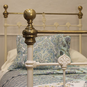 single antique bed in cream