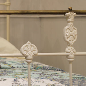 single antique bed in cream