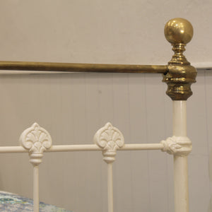 single antique bed in cream