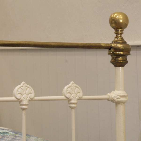 single antique bed in cream