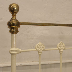 single antique bed in cream