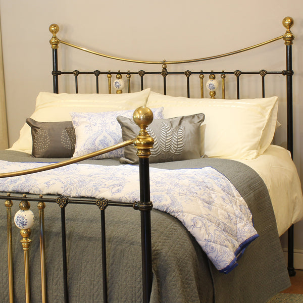 King Antique Bed in Black with Blue Porcelain Ball Decoration