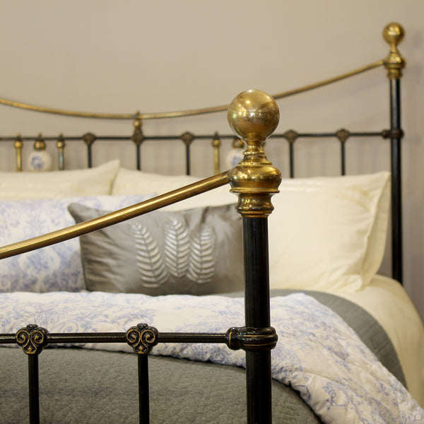 King Antique Bed in Black with Blue Porcelain Ball Decoration