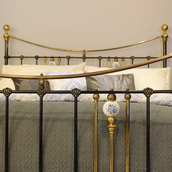 King Antique Bed in Black with Blue Porcelain Ball Decoration