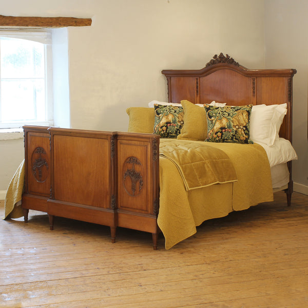 Mahogany antique bed with floral carving