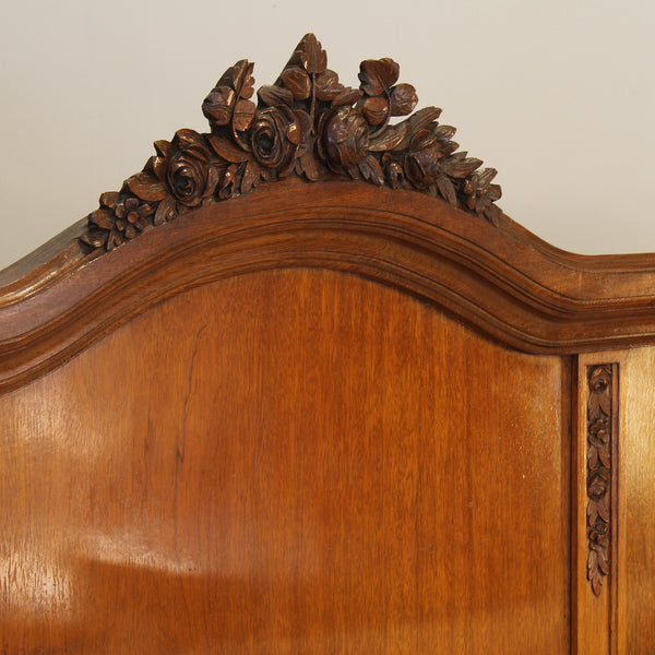 Mahogany antique bed with floral carving
