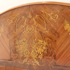 Close up of mahogany antique bed