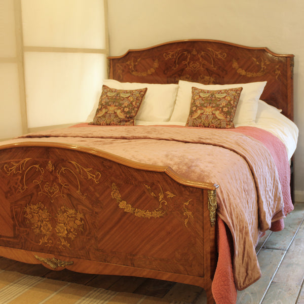 Close up of mahogany antique bed