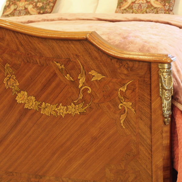 Close up of mahogany antique bed