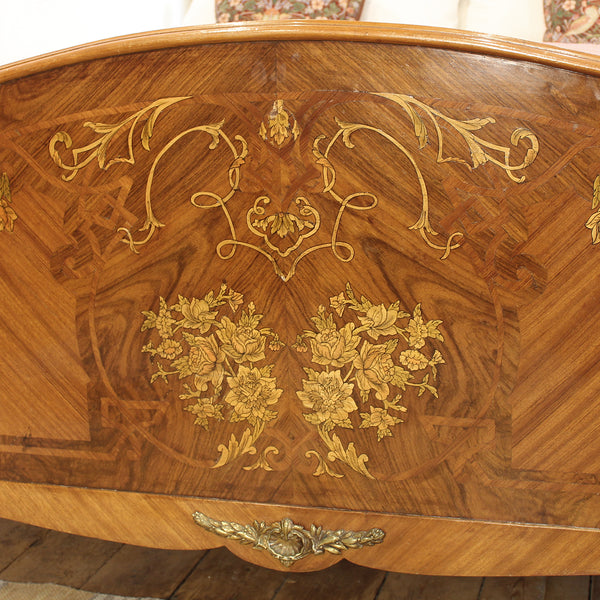 Close up of mahogany antique bed