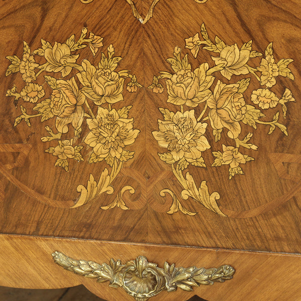 Close up of mahogany antique bed