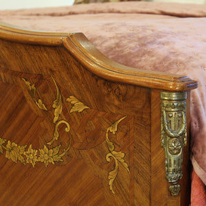 Close up of mahogany antique bed